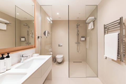 Designer toiletries, hair dryer, bathrobes, slippers