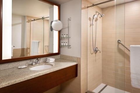 Junior Suite, 1 King Bed, Balcony | Bathroom | Combined shower/tub, deep soaking tub, designer toiletries, hair dryer