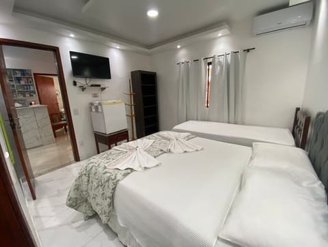 Basic Triple Room, 2 Bedrooms | Desk, blackout drapes, free WiFi, bed sheets
