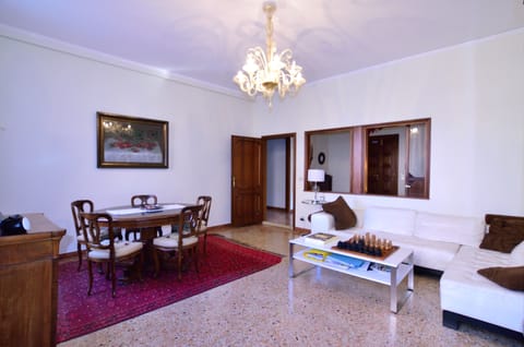 Apartment, 4 Bedrooms | Living area | Flat-screen TV, DVD player