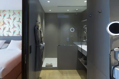 Suite, 1 King Bed, Non Smoking, Jetted Tub (Prestige) | Bathroom | Designer toiletries, hair dryer, towels, soap