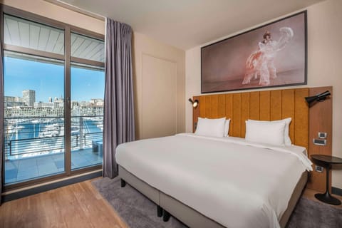 Suite, 1 Bedroom, Terrace (Port View) | Hypo-allergenic bedding, in-room safe, desk, laptop workspace