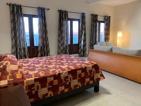 Deluxe Studio Suite | Iron/ironing board, bed sheets