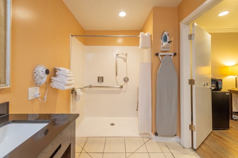 Room, 1 Queen Bed, Mobility Accessible | Bathroom | Shower, free toiletries, hair dryer, towels