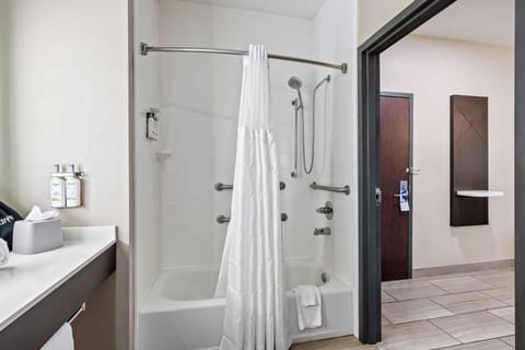 Suite, 1 King Bed, Accessible (Communications) | Bathroom | Hair dryer, towels