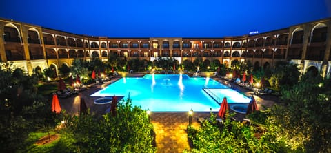 Indoor pool, outdoor pool, pool umbrellas, sun loungers