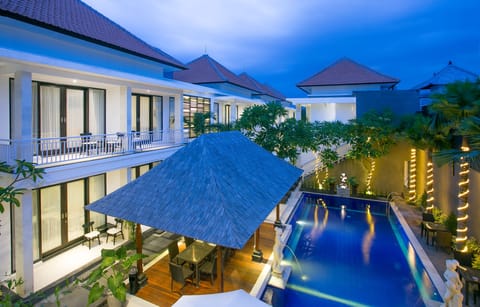 Outdoor pool, open 7:00 AM to 10:00 PM, pool umbrellas, sun loungers