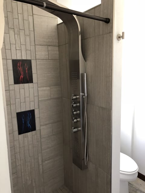 Deluxe Room, 2 Queen Beds | Bathroom | Shower, bathrobes, towels