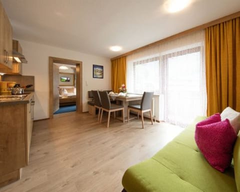 Comfort Apartment, 2 Bedrooms, Balcony, Mountain View (Söldenkogel, plus 30€ cleaning fee) | Living area | Flat-screen TV