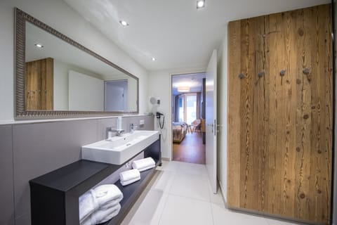 Hair dryer, bathrobes, slippers, heated floors