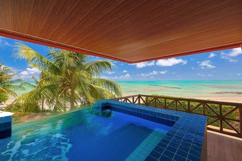 Superior Suite | Living area | 43-inch Smart TV with cable channels