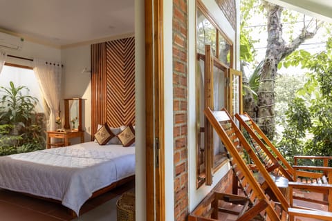 Deluxe Room, Pool View | Blackout drapes, free WiFi, bed sheets