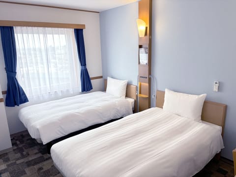 Desk, laptop workspace, free WiFi, bed sheets