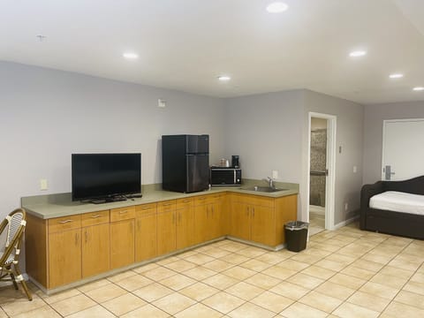 Superior Room, Multiple Beds | Living area | 40-inch LED TV with cable channels, TV