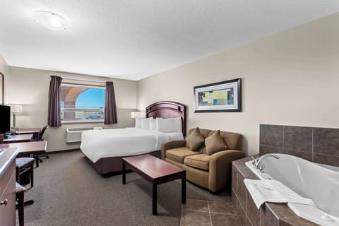 Suite, 1 King Bed, Non Smoking, Jetted Tub (2nd Floor) | Desk, laptop workspace, soundproofing, iron/ironing board (on request)