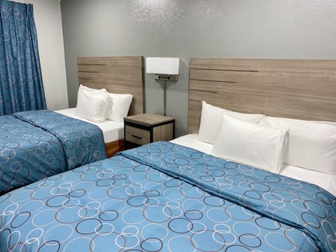 Deluxe Room, 2 Queen Beds, Smoking | Desk, blackout drapes, iron/ironing board, free WiFi