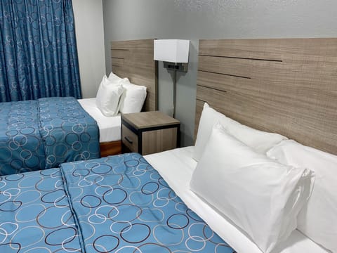 Deluxe Room, 2 Queen Beds, Smoking | Desk, blackout drapes, iron/ironing board, free WiFi