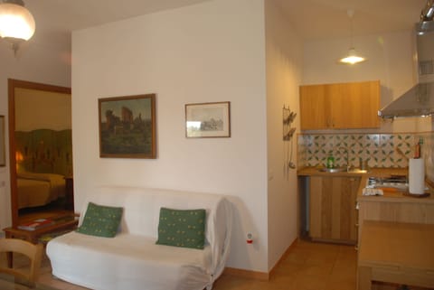 Standard Apartment, 2 Bedrooms, Fireplace, Garden Area | Living area | TV, fireplace