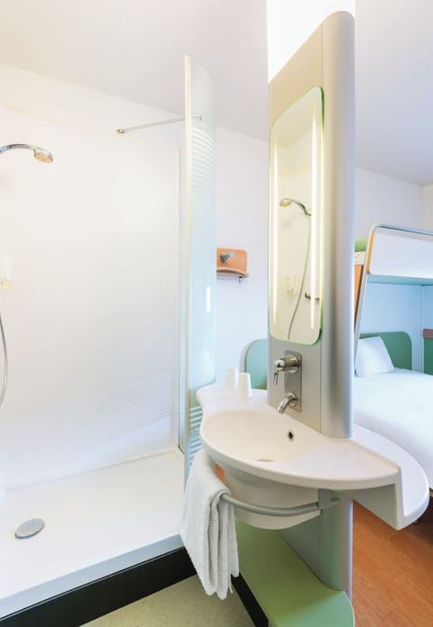 Shower, eco-friendly toiletries, hair dryer, towels