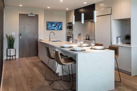 Premium bedding, down comforters, pillowtop beds, minibar