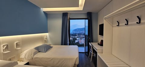 Classic Quadruple Room | Premium bedding, minibar, in-room safe, desk