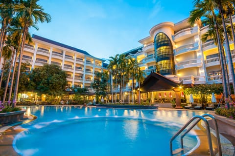 Outdoor pool, open 7:00 AM to 10:00 PM, pool umbrellas, sun loungers