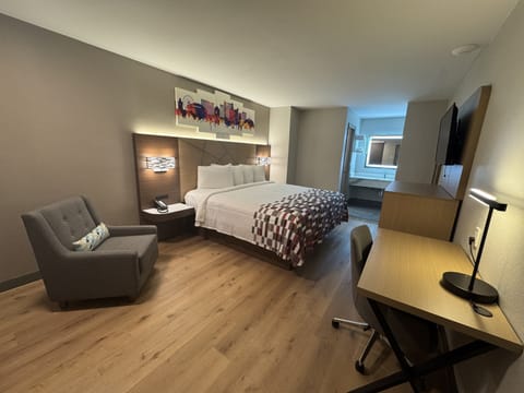 Desk, laptop workspace, blackout drapes, free cribs/infant beds