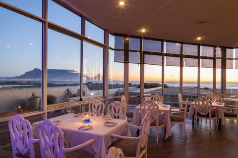 Breakfast, lunch, dinner served; beach views