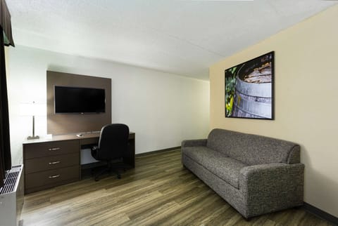 Suite, 1 King Bed with Sofa bed, Non Smoking | Desk, blackout drapes, iron/ironing board, free cribs/infant beds