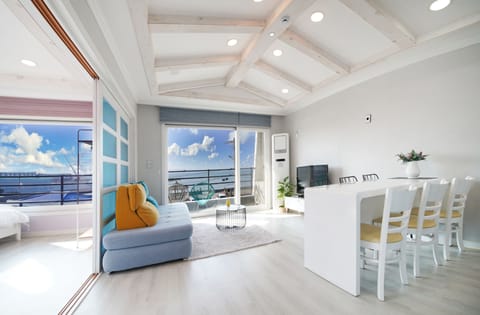 Family Triple Room, 2 Bedrooms (with 1 Living room, 32 PY) | Living area | Flat-screen TV