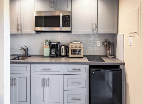 Fridge, microwave, stovetop, coffee/tea maker