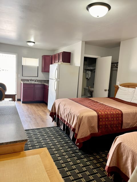 Standard Room, 2 Double Beds | Iron/ironing board, free WiFi, bed sheets