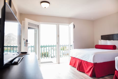 Deluxe Room, 2 Queen Beds, Ocean View | Premium bedding, individually decorated, laptop workspace, free WiFi