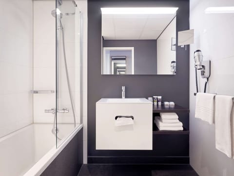 Eco-friendly toiletries, hair dryer, towels