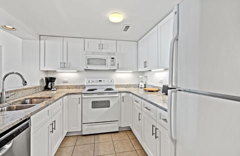 Condo, 2 Bedrooms, Beachfront | Private kitchen | Fridge, microwave, stovetop, dishwasher