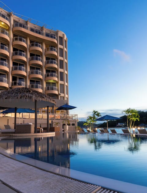 Outdoor pool, pool umbrellas, sun loungers