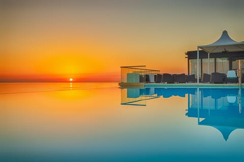 Indoor pool, outdoor pool, pool umbrellas, sun loungers