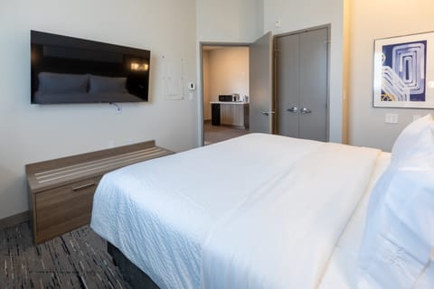 Laptop workspace, blackout drapes, soundproofing, iron/ironing board