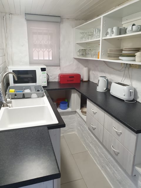 Apartment | Private kitchen | Full-size fridge, microwave, oven, stovetop