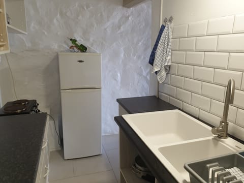 Apartment | Private kitchen | Full-size fridge, microwave, oven, stovetop