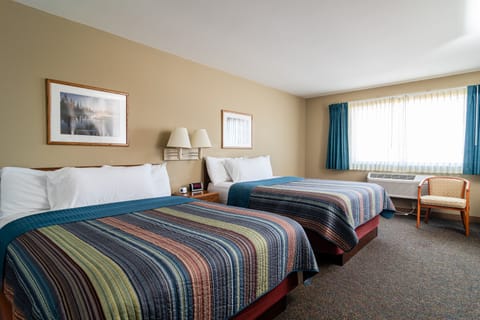 Room, 2 Queen Beds | Blackout drapes, iron/ironing board, free cribs/infant beds