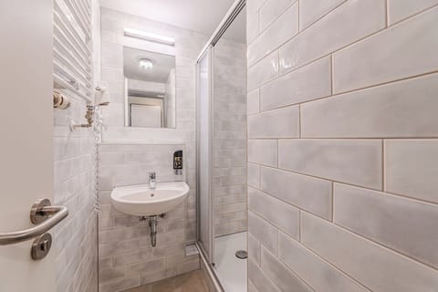 Shower, eco-friendly toiletries, hair dryer, soap