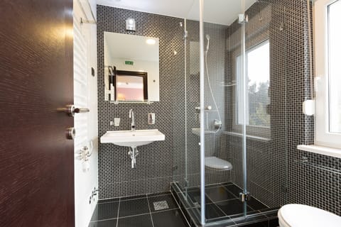 Bathroom | Shower, free toiletries, hair dryer, bathrobes