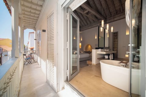 Suite, 1 Bedroom | Living area | Flat-screen TV, iPod dock