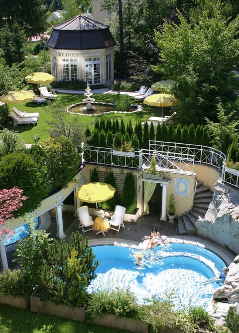 Indoor pool, outdoor pool, pool umbrellas, sun loungers