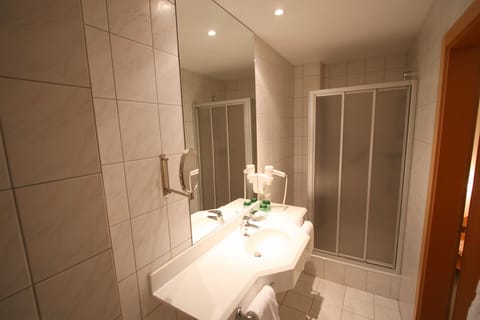 Deep soaking tub, eco-friendly toiletries, hair dryer, towels