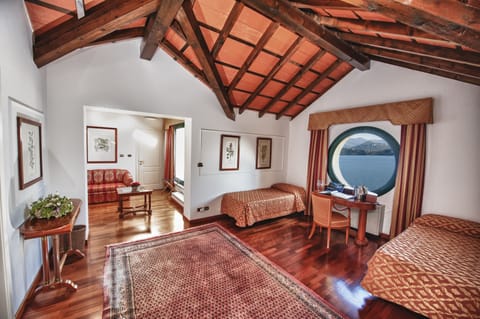 Family Suite, 1 Bedroom, Lake View, Lakeside | Minibar, in-room safe, blackout drapes, soundproofing