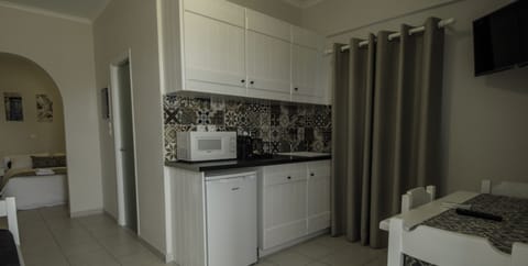 Apartment, Sea View | Private kitchen | Mini-fridge, electric kettle