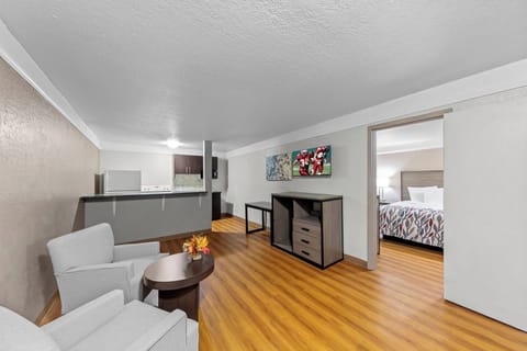 Desk, blackout drapes, iron/ironing board, free cribs/infant beds