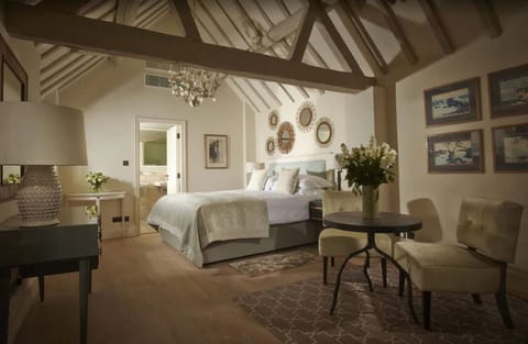 Designer toiletries, hair dryer, bathrobes, slippers